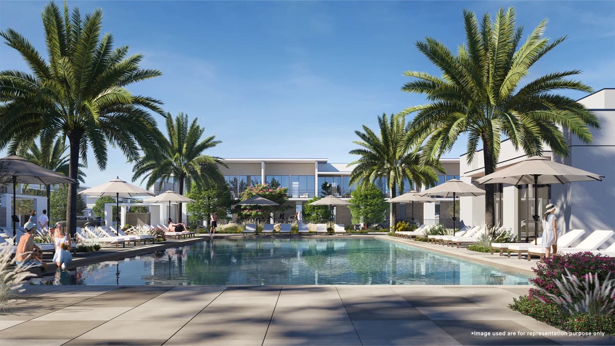 Emaar Lillia At The Valley Dubai Swimming pool area surrounded by palm trees and relaxation spaces